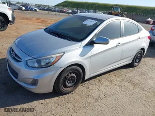 2015 Hyundai Accent GLS with VIN KMHCT4AE5FU808332, listed as a IAAI auction lot 42033625 with 195,433 mi miles. Bid and sale history available at carsss.com. Image 2.