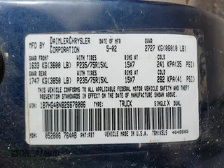 2002 Dodge Dakota SLT z VIN 1B7HG48N82S678086, wystawiony jako IAAI lot #42189540 z przebiegiem Nie podano mil oraz . Historia ofert i sprzedaży dostępna na DreamBid. Obrazek 9.