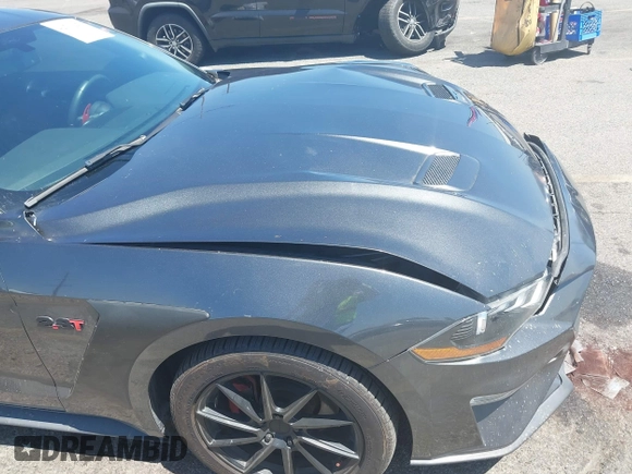 2019 Ford Mustang EcoBoost with VIN 1FA6P8TH5K5181274, listed as a IAAI auction lot 42719275 with 91,605 mi miles and . Bid and sale history available at DreamBid. Image 18.