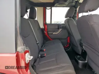 2013 Jeep Wrangler Unlimited Sport z VIN 1C4BJWDGXDL606491, wystawiony jako Copart lot #56065425 z przebiegiem 168 709 mil mil oraz Szkoda całkowita • Salvage title. Historia ofert i sprzedaży dostępna na DreamBid. Obrazek 11.