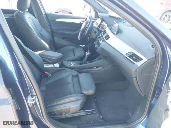 2019 BMW X1 sDrive28i with VIN WBXHU7C54K5L11298, listed as a IAAI auction lot 41662155 with 36,753 mi miles. Bid and sale history available at carsss.com. Image 5.