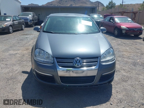 2009 Volkswagen Jetta SE z VIN 3VWRZ71K09M088979, wystawiony jako IAAI lot #42532075 z przebiegiem 179 179 mil mil oraz . Historia ofert i sprzedaży dostępna na DreamBid. Obrazek 6.