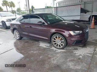 2015 Audi A3 Premium with VIN WAUACGFFXF1032633, listed as a IAAI auction lot 42745016 with 57,222 mi miles and . Bid and sale history available at DreamBid. Image 1.