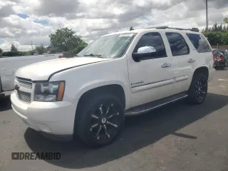 2008 Chevrolet Tahoe LTZ with VIN 1GNFK13038R240129, listed as a Copart auction lot 56598485 with 240,767 mi miles and Salvage title. Bid and sale history available at DreamBid. Image 1.