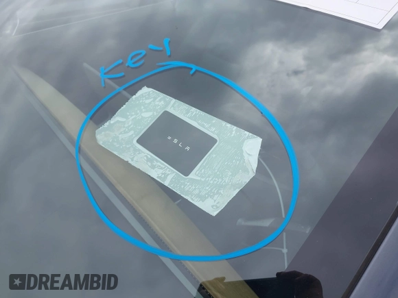 2018 Tesla Model 3 Long Range Battery with VIN 5YJ3E1EA8JF059385, listed as a IAAI auction lot 42116589 with 63,630 mi miles and . Bid and sale history available at DreamBid. Image 11.
