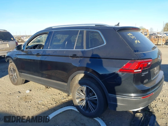 2018 Volkswagen Tiguan SEL with VIN 3VV3B7AX7JM117053, listed as a IAAI auction lot 40827695 with 71,489 mi miles and . Bid and sale history available at DreamBid. Image 14.