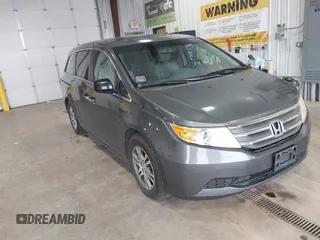 2011 Honda Odyssey EX-L with VIN 5FNRL5H68BB052615, listed as a IAAI auction lot 42605184 with 165,471 mi miles and . Bid and sale history available at DreamBid. Image 1.