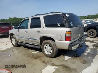 2005 GMC Yukon SLE z VIN 1GKEC13T75J179930, wystawiony jako Copart lot #57259205 z przebiegiem 310 454 mil mil oraz Szkody całkowita. Historia ofert i sprzedaży dostępna na DreamBid. Obrazek 2.