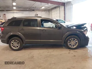 2017 Dodge Journey SXT z VIN 3C4PDCBGXHT534121, wystawiony jako IAAI lot #42145689 z przebiegiem 201 527 mil mil oraz . Historia ofert i sprzedaży dostępna na DreamBid. Obrazek 13.