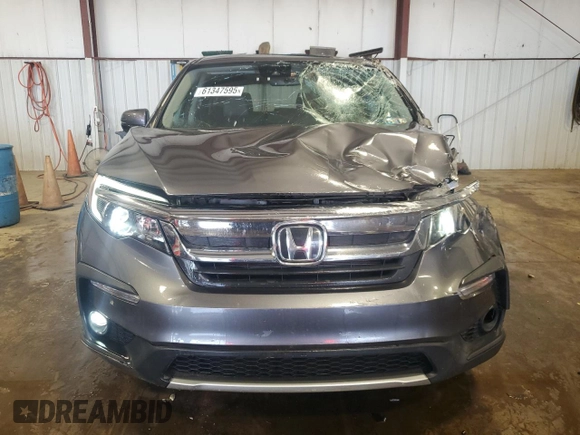 2019 Honda Pilot EX-L z VIN 5FNYF6H58KB100677, wystawiony jako Copart lot #61347595 z przebiegiem 59 987 mil mil oraz Szkoda całkowita • Salvage title. Historia ofert i sprzedaży dostępna na DreamBid. Obrazek 5.