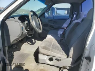 1997 Ford F-150 с VIN 1FTDF18W8VKC62309, выставлен на аукционе Copart как лот 48137745 с пробегом 156 917 миль миль и Списание • Salvage title. История ставок и продаж доступна на DreamBid. Изображение 7.