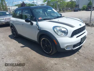 2012 MINI Countryman S z VIN WMWZC3C58CWM26699, wystawiony jako IAAI lot #42361630 z przebiegiem 88 177 mil mil oraz . Historia ofert i sprzedaży dostępna na DreamBid. Obrazek 1.