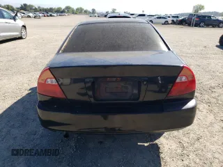 2002 Mitsubishi Mirage DE z VIN JA3AY11A02U013027, wystawiony jako Copart lot #73217194 z przebiegiem 155 865 mil mil oraz Szkoda całkowita • Salvage title. Historia ofert i sprzedaży dostępna na DreamBid. Obrazek 6.