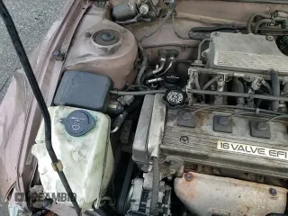 1993 Toyota Corolla z VIN JT2AE09E4P0042372, wystawiony jako Copart lot #86842234 z przebiegiem 227 139 mil mil oraz Szkoda całkowita • Salvage title. Historia ofert i sprzedaży dostępna na DreamBid. Obrazek 16.