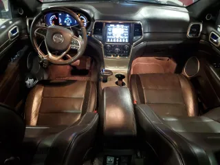 2015 Jeep Grand Cherokee Summit with VIN 1C4RJFJG2FC664245, listed as a Copart auction lot 54131515 with 141,605 mi miles and Salvage Title. Bid and sale history available at DreamBid. Image 8.