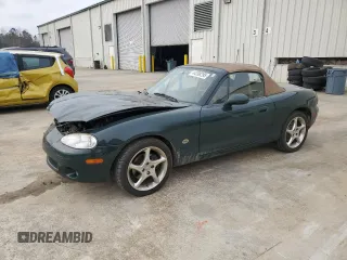 2001 Mazda MX-5 Miata z VIN JM1NB353810212392, wystawiony jako Copart lot #44398295 z przebiegiem 88 601 mil mil oraz Szkoda całkowita • Salvage title. Historia ofert i sprzedaży dostępna na DreamBid. Obrazek 1.