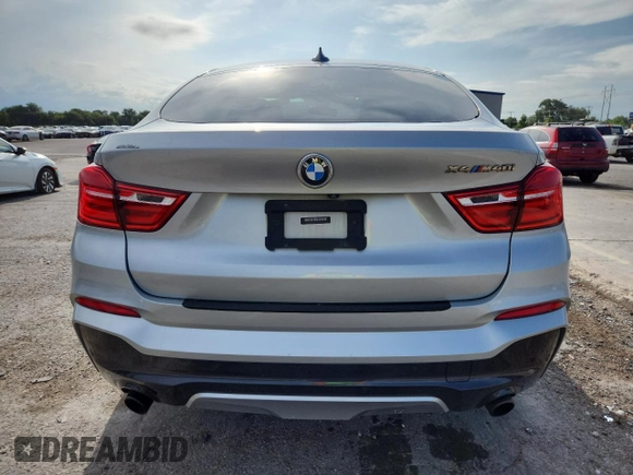 2017 BMW X4 M40i with VIN 5UXXW7C36H0U26510, listed as a Copart auction lot 62700515 with Not provided miles and Salvage title. Bid and sale history available at DreamBid. Image 6.