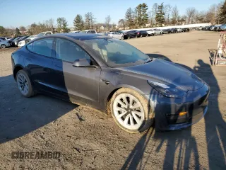 2023 Tesla Model 3 Long Range with VIN 5YJ3E1EB3PF703943, listed as a Copart auction lot 46411505 with Not Provided miles and Salvage Title. Bid and sale history available at DreamBid. Image 4.