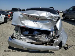 2010 Cadillac DTS 1SA z VIN 1G6KA5EYXAU100721, wystawiony jako Copart lot #69624144 z przebiegiem 175 627 mil mil oraz Szkoda całkowita • Salvage title. Historia ofert i sprzedaży dostępna na DreamBid. Obrazek 6.