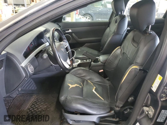 2009 Pontiac G8 z VIN 6G2ER57769L192376, wystawiony jako Copart lot #58634365 z przebiegiem 206 095 mil mil oraz Tytuł czysty. Historia ofert i sprzedaży dostępna na DreamBid. Obrazek 7.