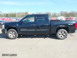 2011 Chevrolet Silverado 1500 LS with VIN 3GCPKREA4BG353984, listed as a IAAI auction lot 42094148 with 218,766 mi miles. Bid and sale history available at carsss.com. Image 14.