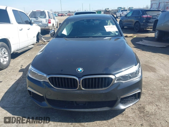 2019 BMW 5 Series M550i xDrive with VIN WBAJB9C51KB464879, listed as a IAAI auction lot 41774834 with 77,379 mi miles and . Bid and sale history available at DreamBid. Image 12.