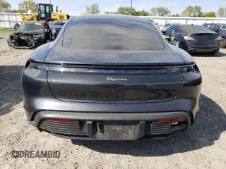 2023 Porsche Taycan with VIN WP0AA2Y18PSA16703, listed as a Copart auction lot 50559135 with 11,428 mi miles and Salvage Title. Bid and sale history available at DreamBid. Image 6.