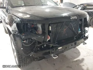 2014 Jeep Grand Cherokee Overland with VIN 1C4RJFCGXEC162109, listed as a IAAI auction lot 41943979 with 147,788 mi miles. Bid and sale history available at carsss.com. Image 18.