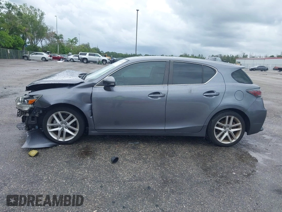 2015 Lexus CT 200h z VIN JTHKD5BH5F2214474, wystawiony jako IAAI lot #42417192 z przebiegiem 104 802 mil mil oraz . Historia ofert i sprzedaży dostępna na DreamBid. Obrazek 14.