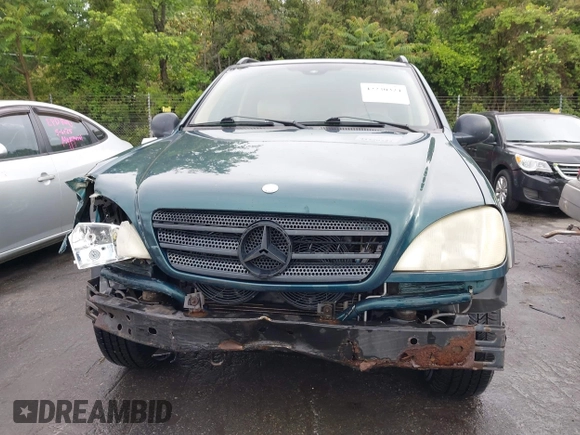 1998 Mercedes-Benz M 320/430/500 z VIN 4JGAB54E5WA006036, wystawiony jako IAAI lot #42230324 z przebiegiem 301 386 mil mil oraz . Historia ofert i sprzedaży dostępna na DreamBid. Obrazek 13.