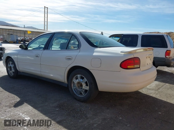 2001 Oldsmobile Intrigue GX z VIN 1G3WH52H11F140740, wystawiony jako IAAI lot #40799284 z przebiegiem 131 940 mil mil oraz . Historia ofert i sprzedaży dostępna na DreamBid. Obrazek 3.