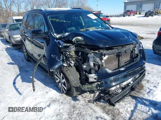 2020 Honda Pilot EX-L z VIN 5FNYF6H59LB051071, wystawiony jako IAAI lot #41303821 z przebiegiem 145 271 mil mil oraz . Historia ofert i sprzedaży dostępna na DreamBid. Obrazek 1.