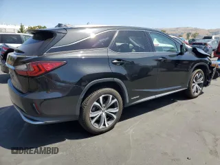 2018 Lexus RX 450hL Premium with VIN JTJDGKCAXJ2000538, listed as a Copart auction lot 61776195 with 74,988 mi miles and Salvage title. Bid and sale history available at DreamBid. Image 3.