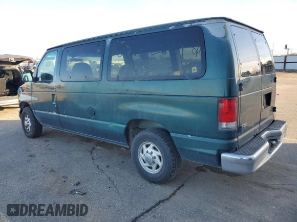 1999 Ford Econoline Passenger XL with VIN 1FMRE1126XHB41841, listed as a Copart auction lot 51338135 with 161,416 mi miles and Clean title. Bid and sale history available at DreamBid. Image 2.