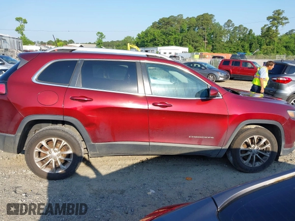 2019 Jeep Cherokee Latitude z VIN 1C4PJLCB9KD325901, wystawiony jako IAAI lot #42234702 z przebiegiem 212 784 mil mil oraz . Historia ofert i sprzedaży dostępna na DreamBid. Obrazek 13.