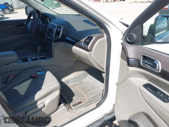2011 Jeep Grand Cherokee Laredo with VIN 1J4RR4GG9BC556083, listed as a IAAI auction lot 42139453 with 145,623 mi miles and . Bid and sale history available at DreamBid. Image 5.