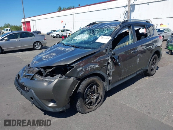 2015 Toyota RAV4 LE with VIN JTMBFREV2FD124756, listed as a IAAI auction lot 42051691 with 92,699 mi miles and . Bid and sale history available at DreamBid. Image 2.