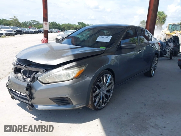 2016 Nissan Altima S with VIN 1N4AL3AP2GN307147, listed as a IAAI auction lot 42367981 with 114,936 mi miles and . Bid and sale history available at DreamBid. Image 2.