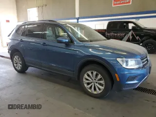 2019 Volkswagen Tiguan S with VIN 3VV0B7AX2KM197883, listed as a Copart auction lot 64978515 with 54,961 mi miles and Salvage title. Bid and sale history available at DreamBid. Image 4.