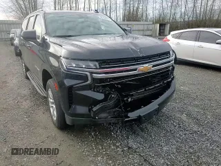 2023 Chevrolet Suburban LT with VIN 1GNSCCKD3PR125671, listed as a Copart auction lot 46734575 with 158,217 mi miles and Salvage title. Bid and sale history available at DreamBid. Image 11.