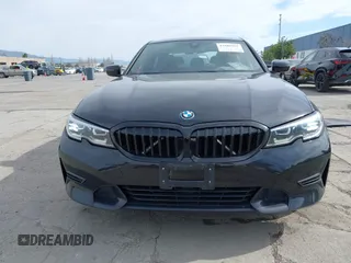 2022 BMW 3 Series 330e with VIN 3MW5P7J06N8C50460, listed as a IAAI auction lot 41688267 with 27,707 mi miles. Bid and sale history available at carsss.com. Image 12.