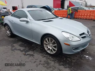 2005 Mercedes-Benz SLK-Class with VIN WDBWK56FX5F040781, listed as a IAAI auction lot 41321130 with 100,319 mi miles. Bid and sale history available at carsss.com. Image 1.