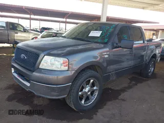 2004 Ford F-150 XLT with VIN 1FTRW12W14KD43052, listed as a IAAI auction lot 41439615 with 241,554 mi miles. Bid and sale history available at carsss.com. Image 2.