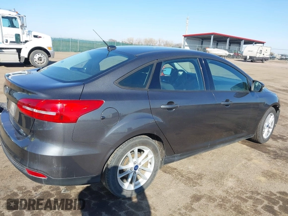 2016 Ford Focus SE with VIN 1FADP3F21GL212718, listed as a IAAI auction lot 41785985 with 101,198 mi miles. Bid and sale history available at carsss.com. Image 4.