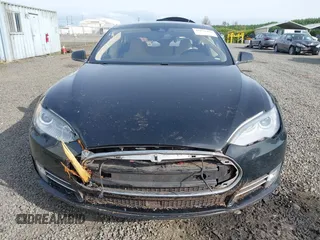 2014 Tesla Model S 60 with VIN 5YJSA1H12EFP53787, listed as a IAAI auction lot 42279493 with 168,859 mi miles and . Bid and sale history available at DreamBid. Image 12.