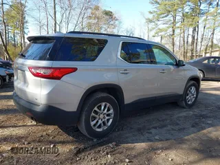 2020 Chevrolet Traverse LT Cloth with VIN 1GNERGKW4LJ215277, listed as a IAAI auction lot 41706394 with 84,762 mi miles. Bid and sale history available at carsss.com. Image 4.