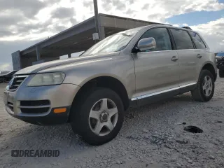2004 Volkswagen Touareg z VIN WVGBC67L24D007688, wystawiony jako Copart lot #44884215 z przebiegiem 187 327 mil mil oraz Czysty tytuł • Clean title. Historia ofert i sprzedaży dostępna na DreamBid. Obrazek 1.