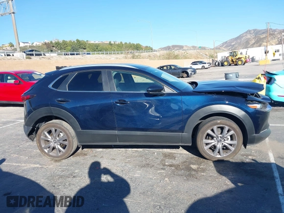 2023 Mazda CX-30 S Select with VIN 3MVDMBBM8PM514475, listed as a IAAI auction lot 41664456 with 33,076 mi miles and . Bid and sale history available at DreamBid. Image 13.