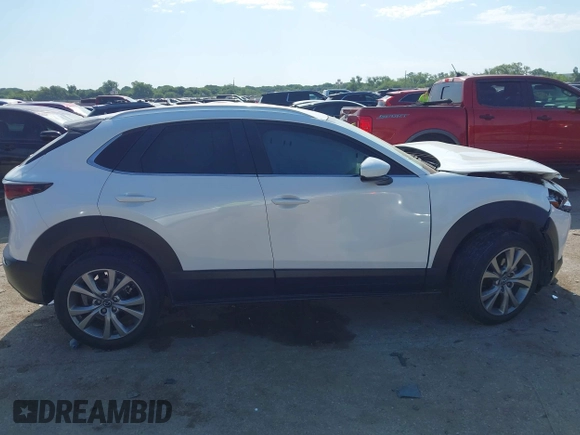 2023 Mazda CX-30 S Carbon Edition with VIN 3MVDMBCM2PM552282, listed as a IAAI auction lot 42241909 with 14,765 mi miles and . Bid and sale history available at DreamBid. Image 13.