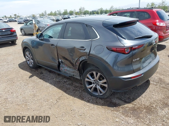 2021 Mazda CX-30 Select with VIN 3MVDMABL5MM210517, listed as a IAAI auction lot 42245033 with 191,303 mi miles and . Bid and sale history available at DreamBid. Image 3.